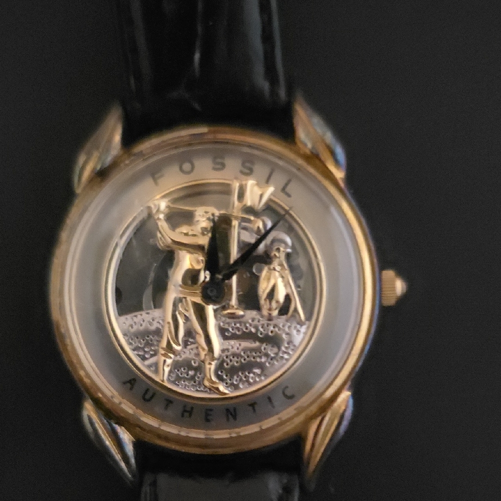 Gol Fossil Black and Gold Golfer Swing Watch. Needs Battery